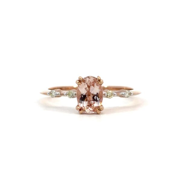 9K Rose Gold Ring Oval Morganite 1.38 Carat and 4 Diamonds TDW 0.08 Carat