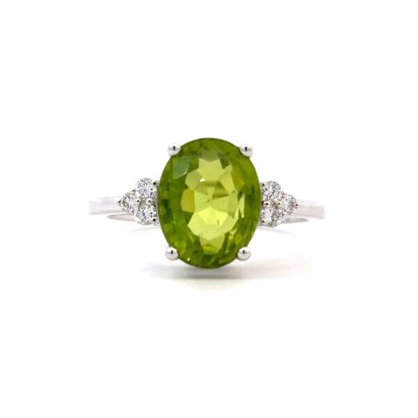 9K White Gold Ring with Oval Peridot 3.47 Carat and 6 Lab Grown Diamonds TDW 0.14 Carat