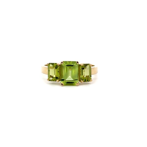 9K Yellow Gold Ring with 3 Emerald cut Peridots TCW 2.65 Carat