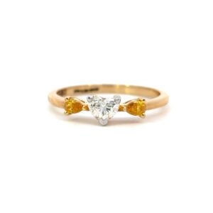 18K Yellow Gold Ring with Heart shaped White Diamond 0.36 Carat and 2 Pear shaped Yellow Diamonds TDW 0.2 Carat