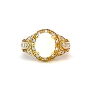 14K Yellow Gold Ring with Oval shaped Australian Opal 1.21 Carat 12 Baguette White Diamonds TDW 0.07 Carat and 20 Round White Diamonds TDW 0.20 Carat