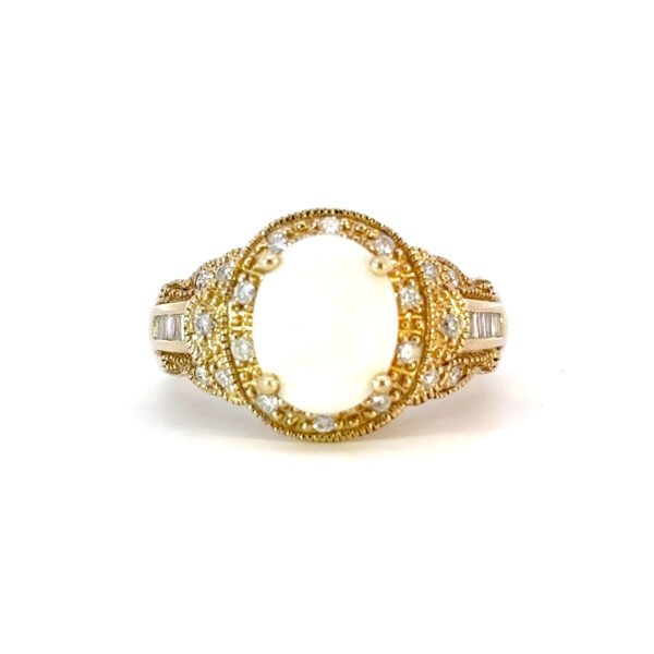 14K Yellow Gold Ring with Oval shaped Australian Opal 1.21 Carat 12 Baguette White Diamonds TDW 0.07 Carat and 20 Round White Diamonds TDW 0.20 Carat