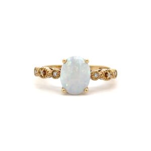 10K Yellow Gold Ring Oval Shaped Australian Opal 1.04 Carat, 6 Round White Diamonds TDW 0.04 Carat