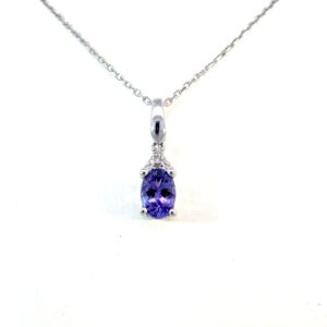 10K White Gold Pendant with Oval Tanzanite 0.86 Carat and 6 Round White Diamonds TDW 0.02 Carat