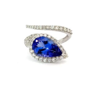 18K White Gold Ring Pear cut Tanzanite 3.32 Carat 63 Round White Diamonds TDW 0.94 Carat