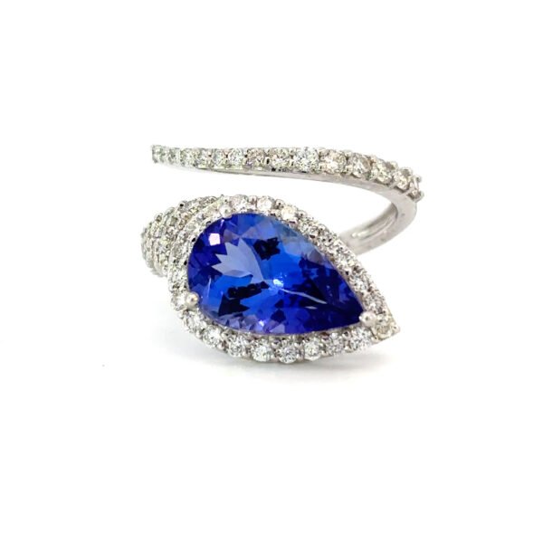 18K White Gold Ring Pear cut Tanzanite 3.32 Carat 63 Round White Diamonds TDW 0.94 Carat