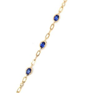14K Yellow Gold Bracelet 3 Oval Tanzanites TCW 1.47 Carat 4 Round White Diamonds TDW 0.10 Carat