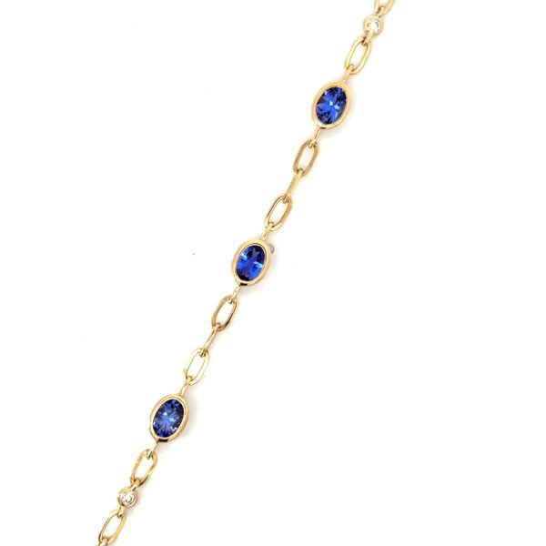 14K Yellow Gold Bracelet 3 Oval Tanzanites TCW 1.47 Carat 4 Round White Diamonds TDW 0.10 Carat
