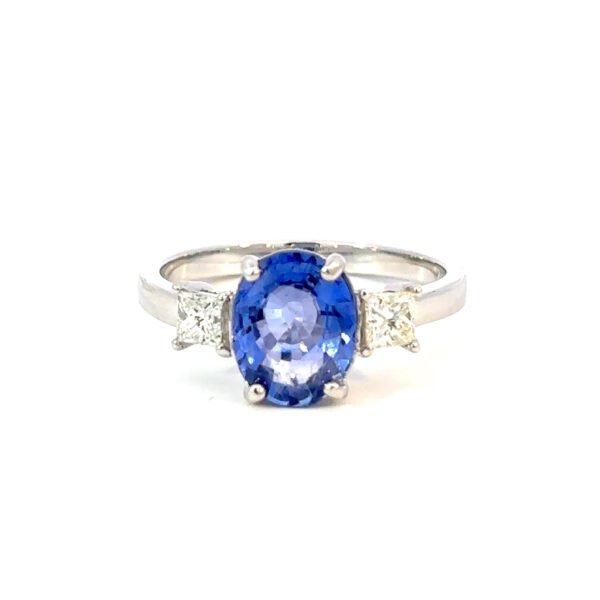 18K White Gold Ring Oval Ceylon Sapphire 2.28 Carat 2 Princess cut White Diamonds TDW 0.38 Carat